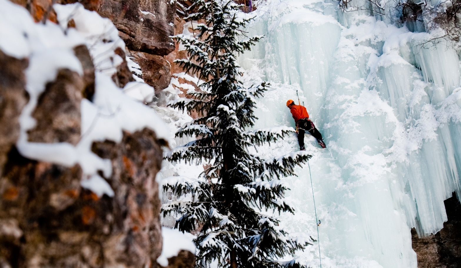 Ice climbing in the mountains of colorado